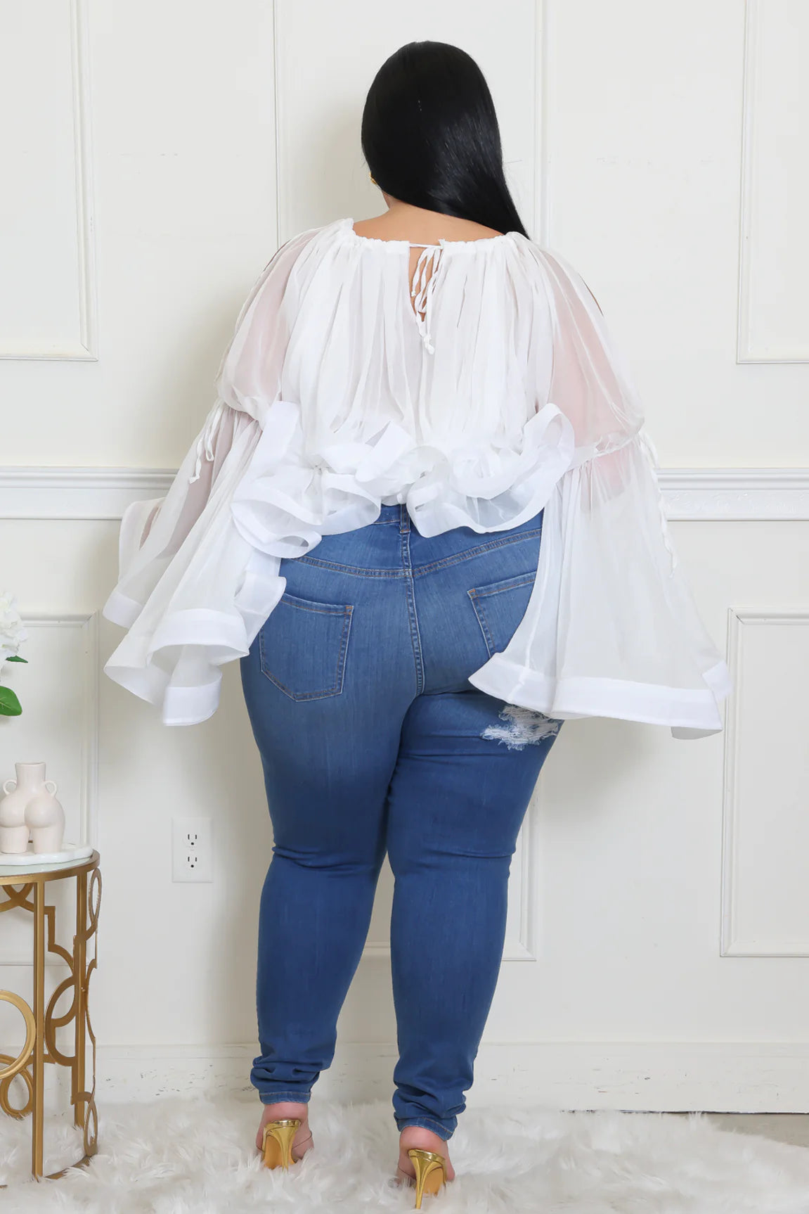 HIGHLY ANTICIPATED TOP